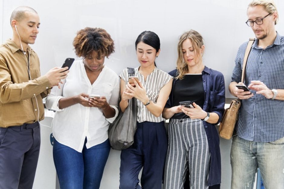 Photography of People Using Smartphones